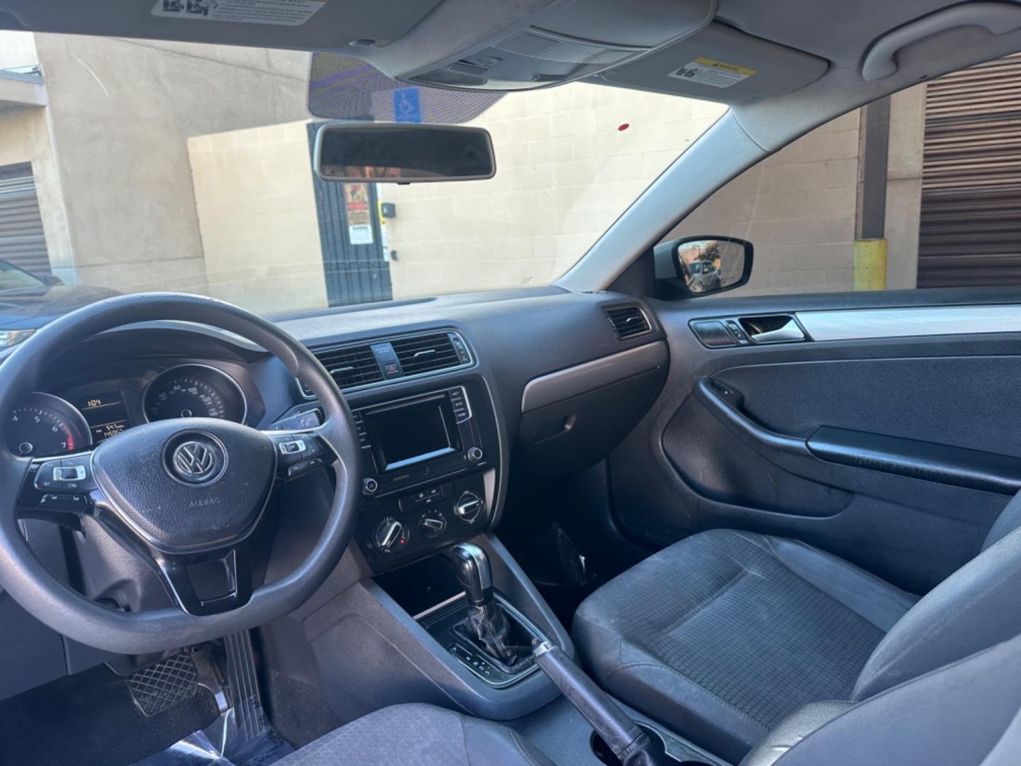 2018 WHITE /BLACK Volkswagen Jetta 1.4T S 6A (3VW2B7AJ9JM) with an 1.4L L4 DOHC 20V engine, 6A transmission, located at 30 S. Berkeley Avenue, Pasadena, CA, 91107, (626) 248-7567, 34.145447, -118.109398 - Crown City Motors is a used “Buy Here Pay Here” car dealer in Pasadena CA. “Buy Here Pay Here” financing, means that when you purchase your vehicle from our dealership, that you make the payments to the dealership as well. We do not need the banks approval to get you approved for a used auto - Photo#8